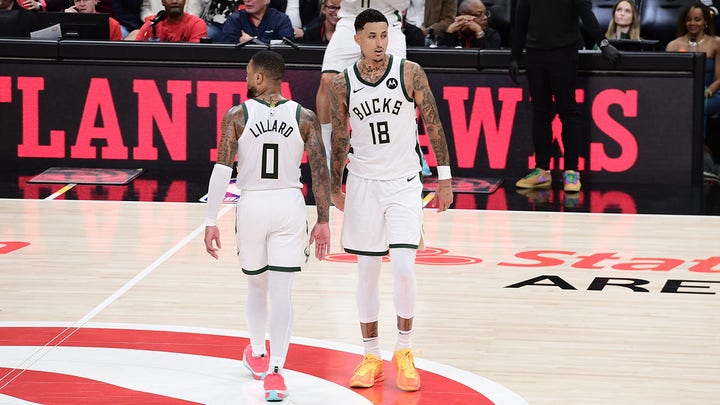 Milwaukee⁢ Bucks players during⁤ a game against the Atlanta Hawks in Atlanta, Georgia.