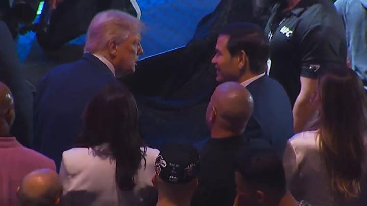 Donald ⁣Trump shakes hands with Marco Rubio‍ at UFC 316 in ‍Newark,⁣ N.J.