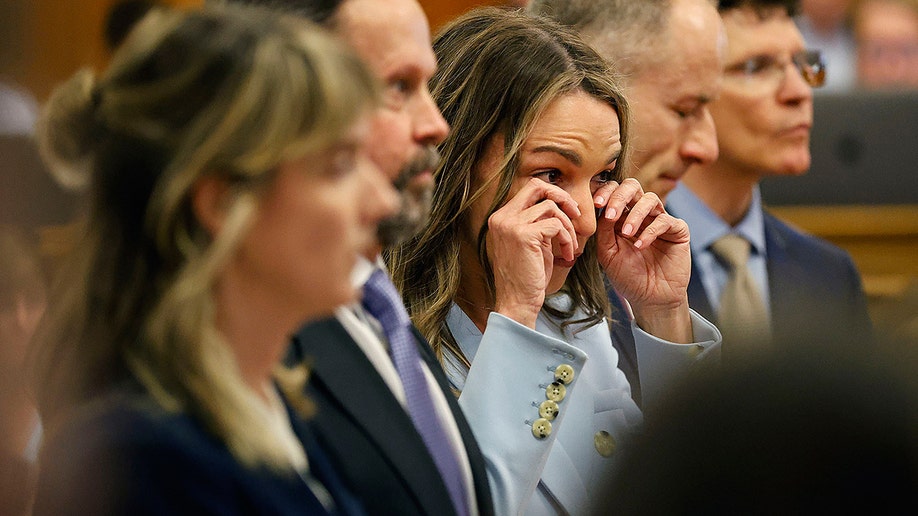 Karen Read crying in court hearing the verdict.