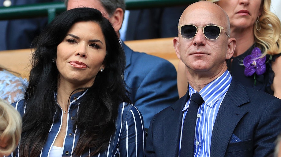 Lauren Sanchez and Jeff Bezos watching Wimbledon in 2019.