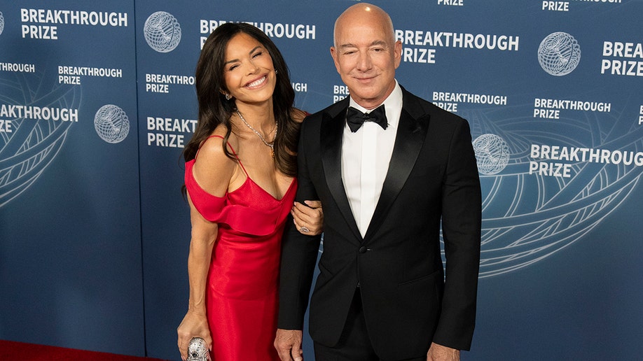 Jeff Bezos and Lauren Sanchez on the red carpet at the Breakthrough Prize Ceremony.