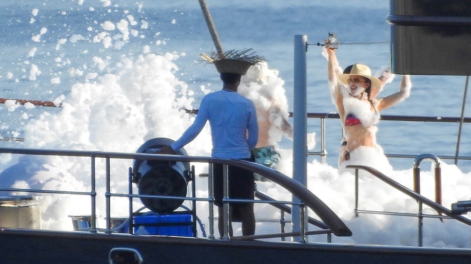 Sanchez and Bezos had fun while partying in the foam while on his yacht.