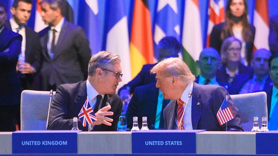 President Donald Trump speaks to Britain's Prime Minister Keir Starmer during a NATO summit at the Hague.