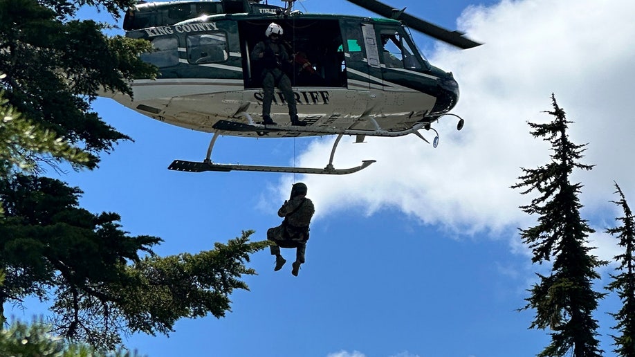 Deputies leaving a helicopter