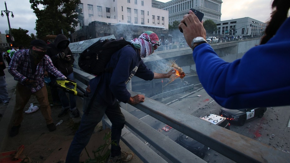 Violence Erupts at LAPD Headquarters: Rioters Smash Windows During Anti-ICE Protest Clashes