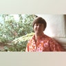 Brian Wilson of the Beach Boys wears a red shirt