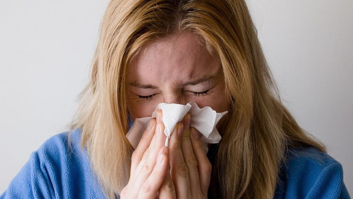 A woman with a sinus infection.