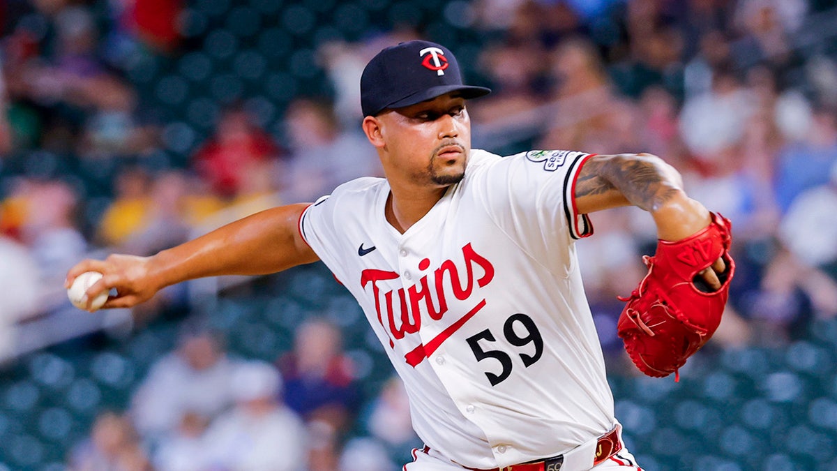 Jhoan Duran pitches