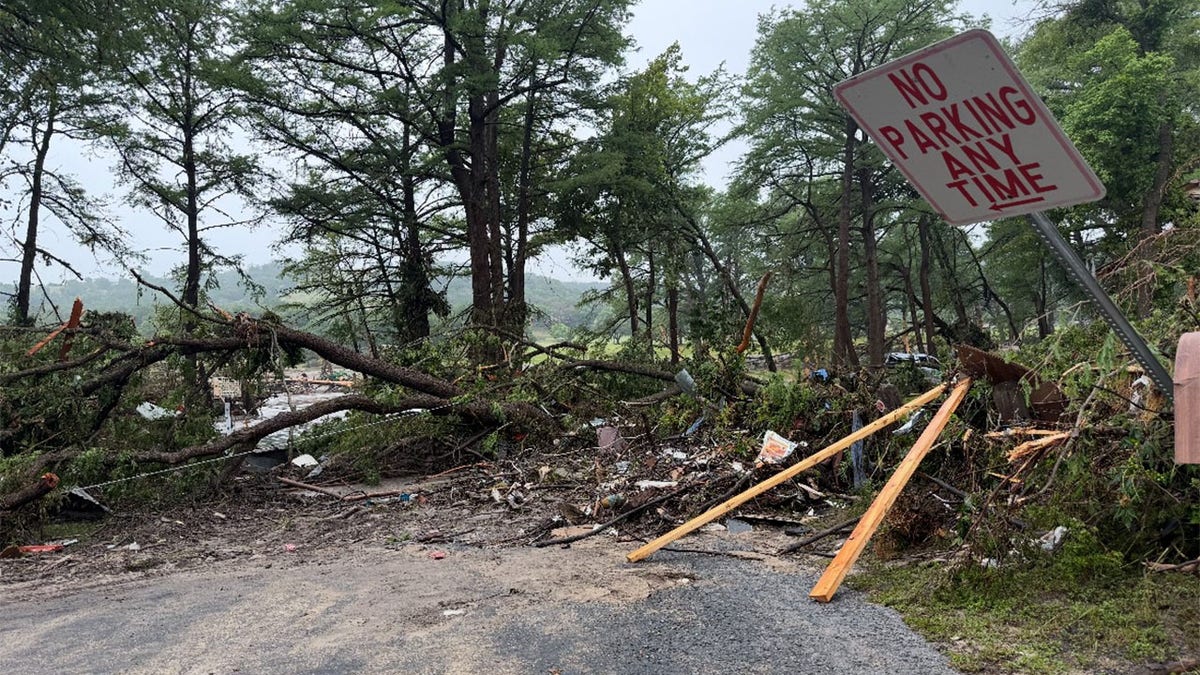 Debris is seen blocking a roadway following the devastating flood in Kerrville, Texas.