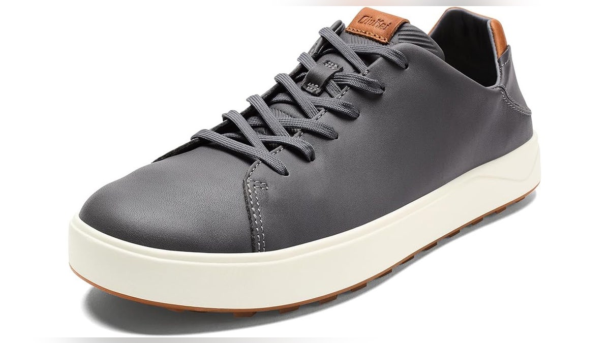 These golf shoes have a clean silhouette and waterproof design. 