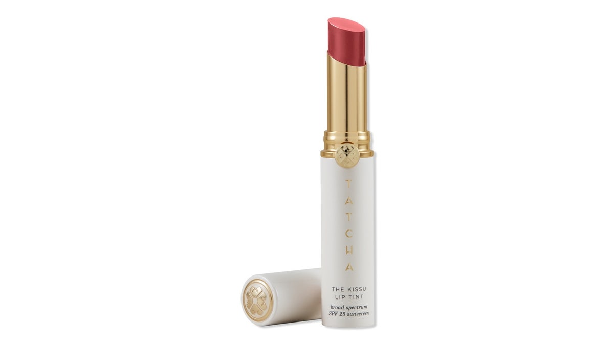 This pigmented lip tint delivers a vibrant, creamy color with SPF 25.