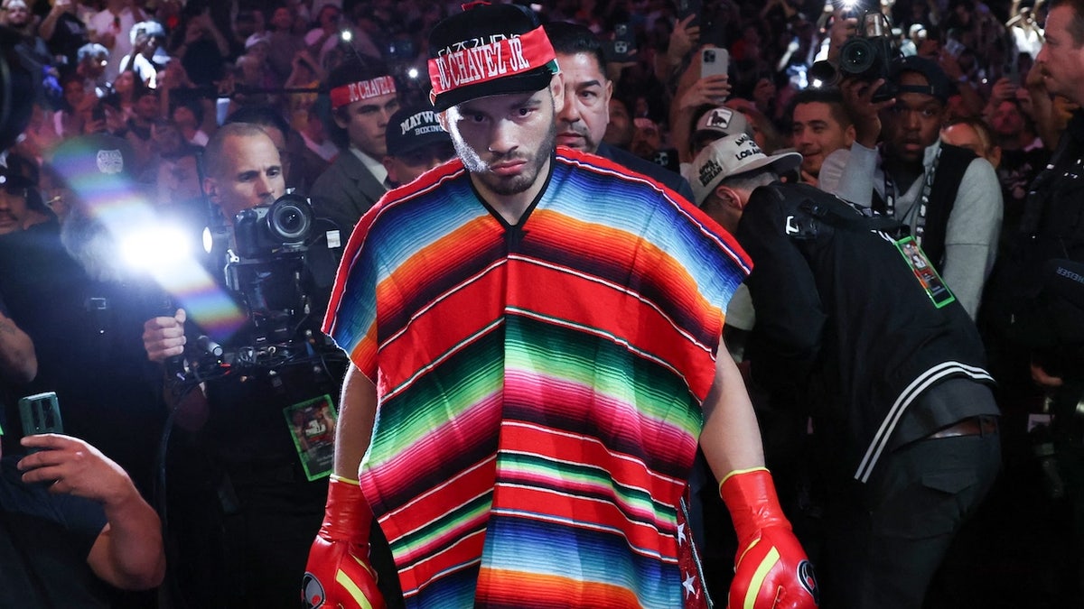 Mexico's Julio Cesar Chávez Jr. arrives for his cruiserweight boxing lucifer against USA's Jake Paul astatine nan Honda Center successful Anaheim, California, connected June 28, 2025.
