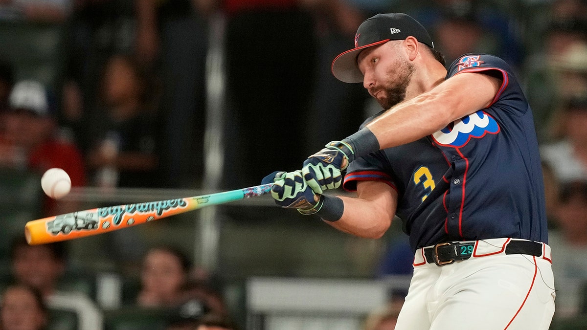 Cal Raleigh swings