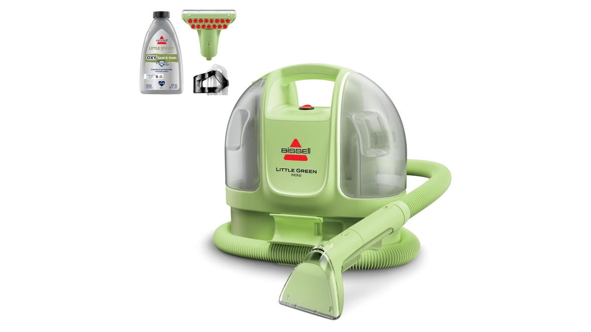 A mini Bissell cleaner gets rid of stains and pet hair with ease.