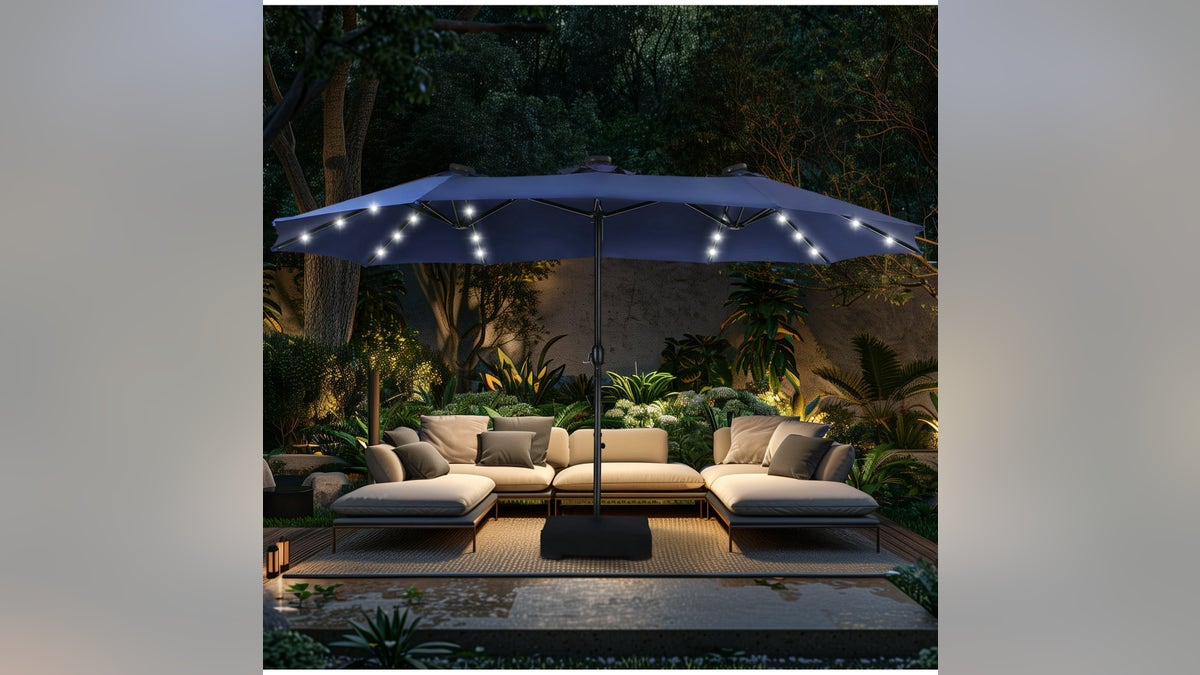 An extra-large patio umbrella keeps guests cool and shaded on hot summer days.