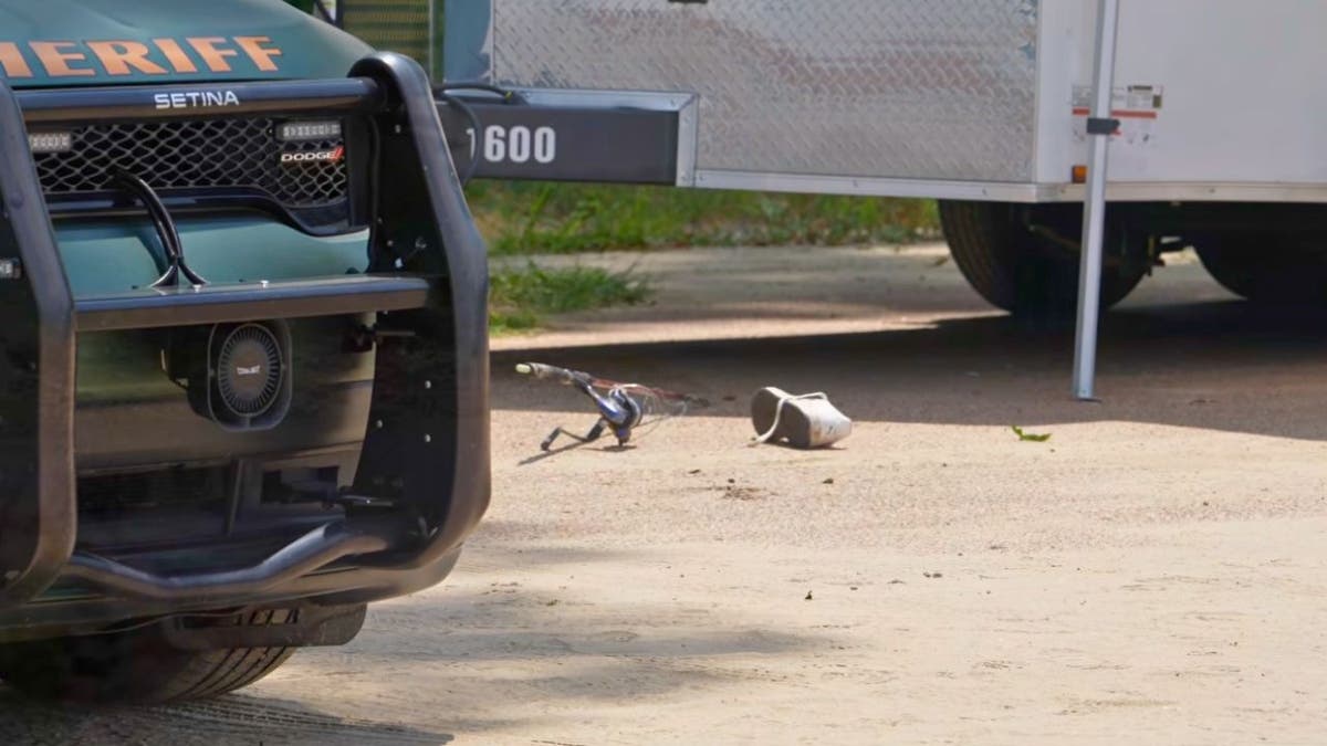a shoe and a fishing rod at the scene