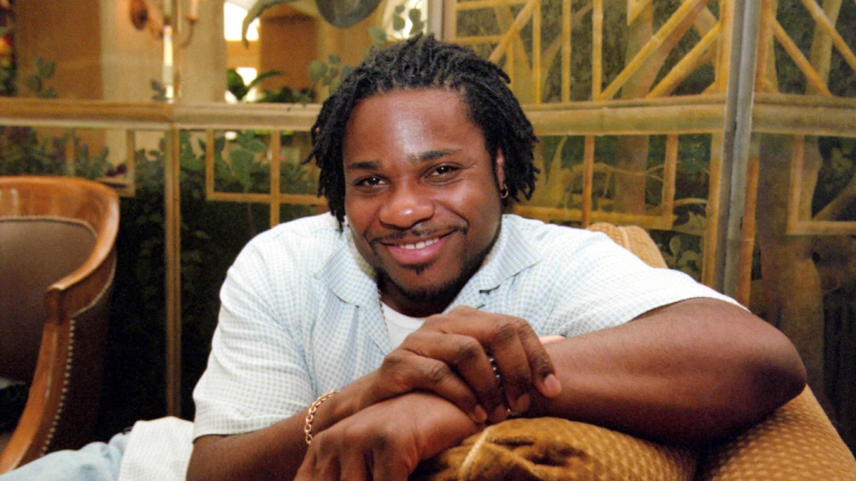 Malcolm-Jamal Warner poses for a photo