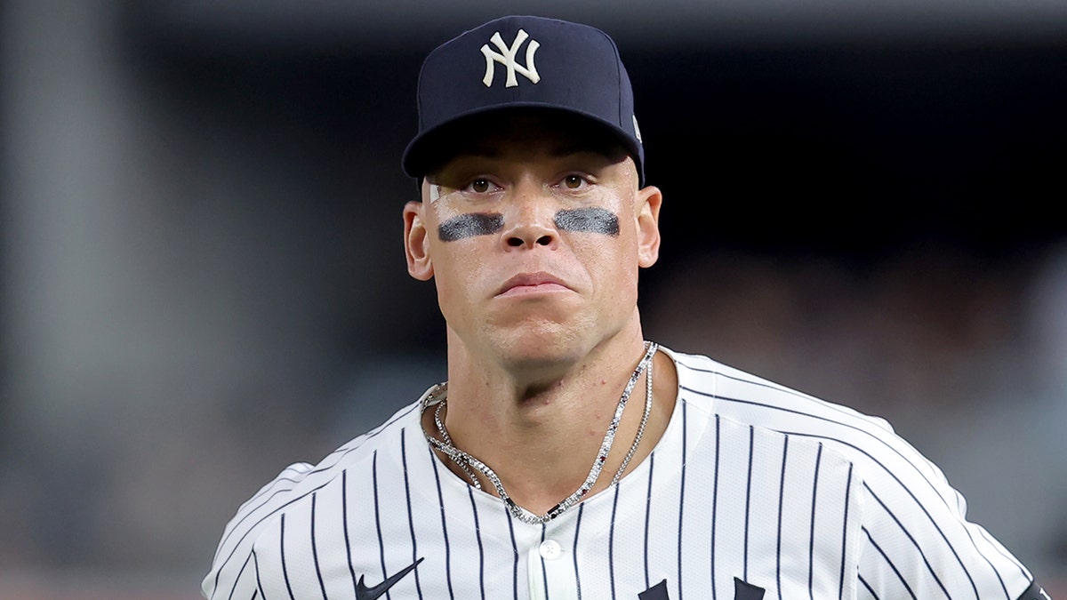 Aaron Judge runs off the field