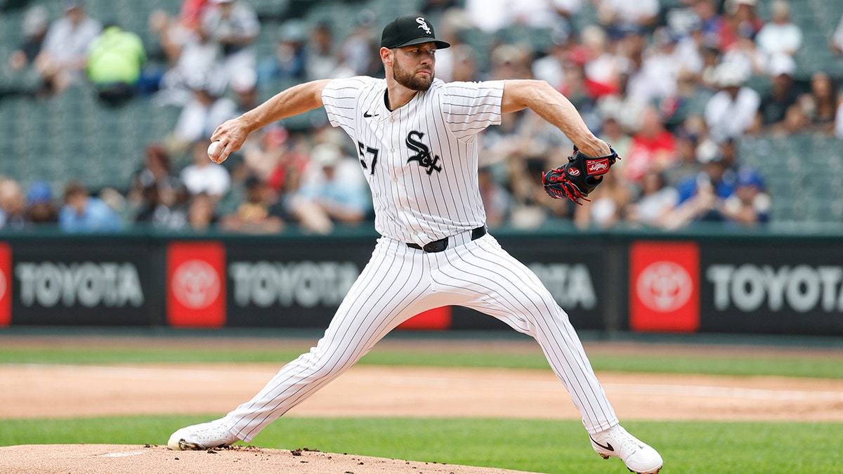 Adrian Houser pitches