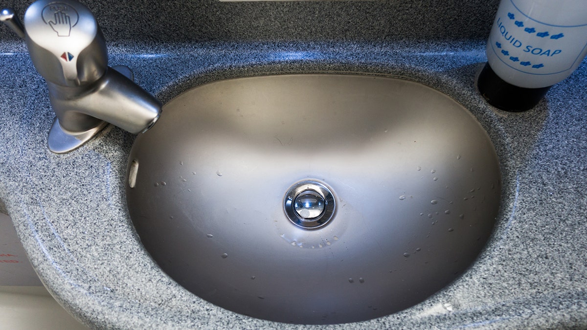 bathroom sink in an airplane