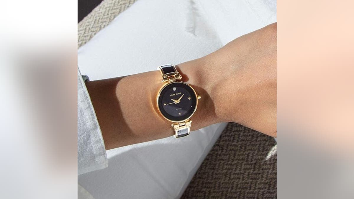 Try an elegant bangle watch to update your look.