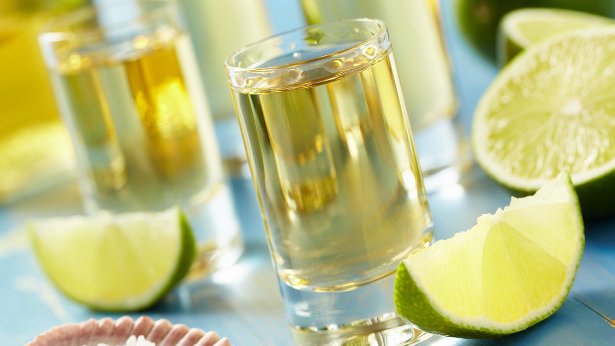 Tequila shot next to lime