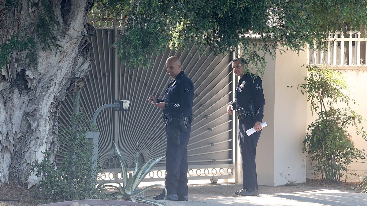 Police in the neighborhood where American Idol music supervisor was found murdered.