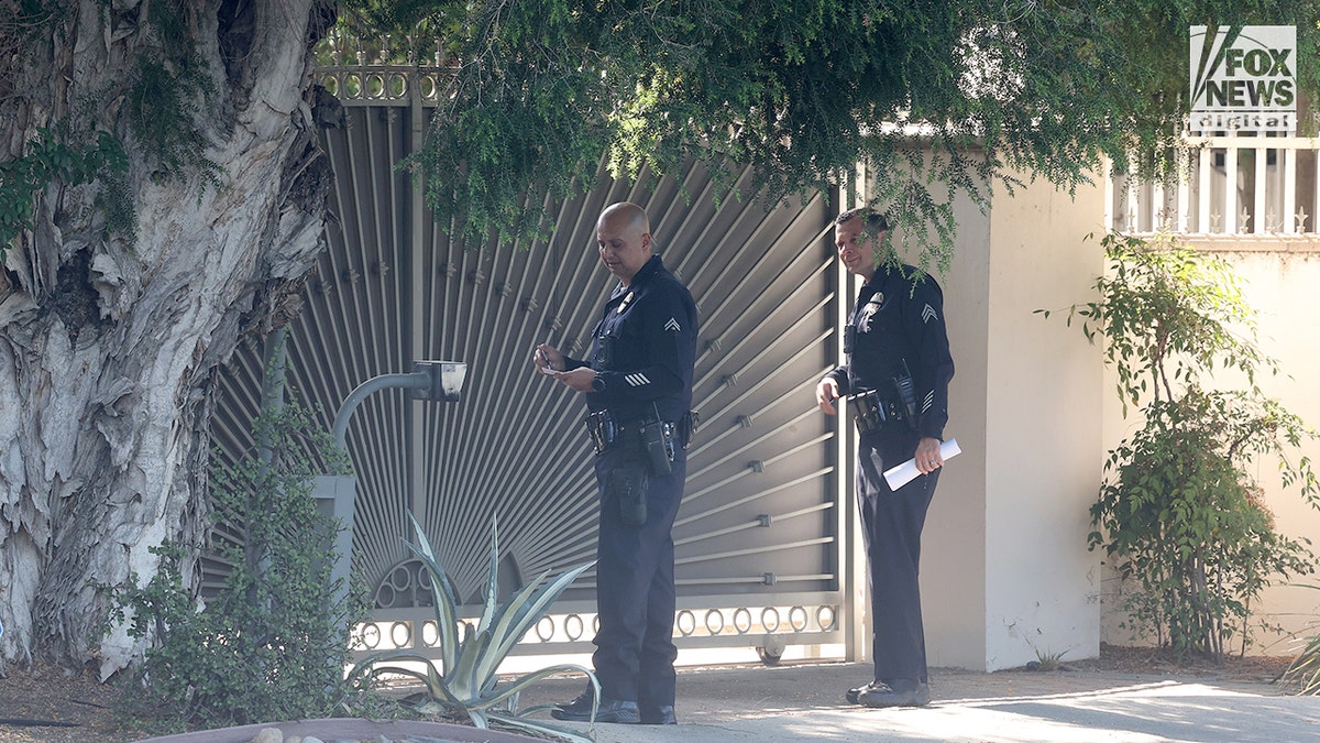 Police in the neighborhood where American Idol music supervisor was found murdered.