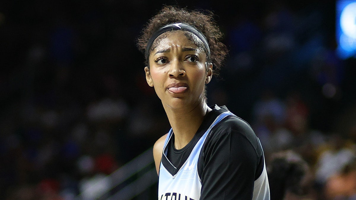 Angel Reese looks on vs Mystics