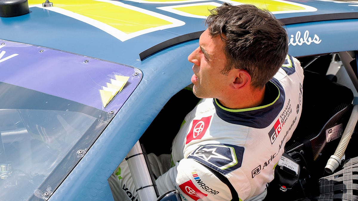 Aric Almirola climbs out of his car