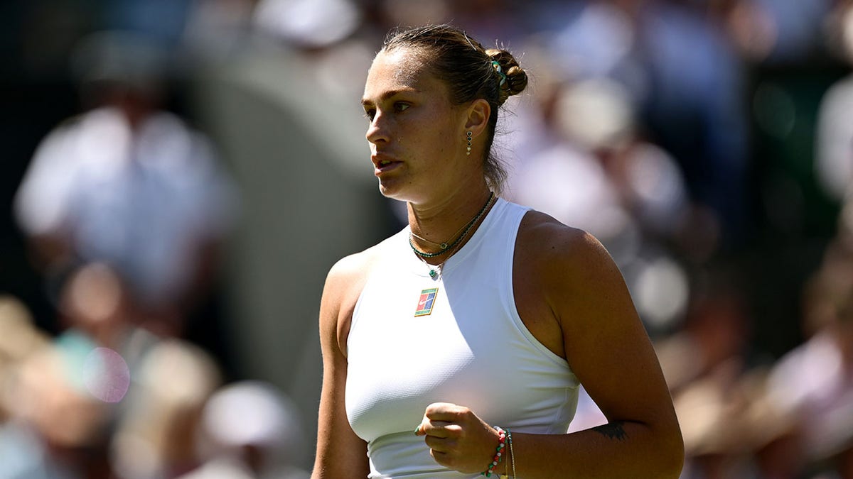 Aryna Sabalenka celebrates 