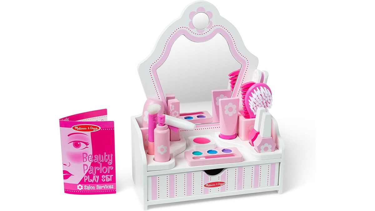 Try a vanity set with everything they need to pretend play.?