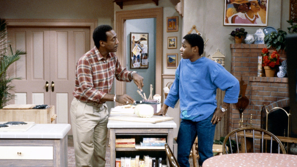 Bill Cosby and Malcolm-Jamal Warner in a scene from "The Cosby Show"