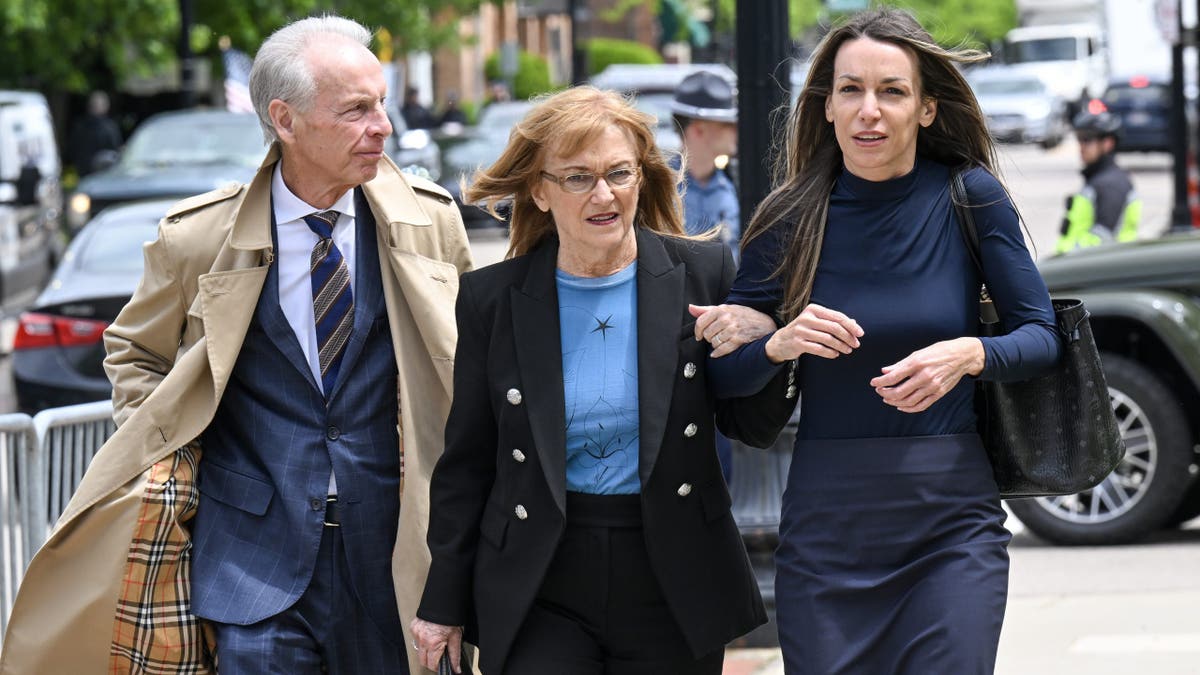 bill janet and karen read arrivbe at dedham courthouse