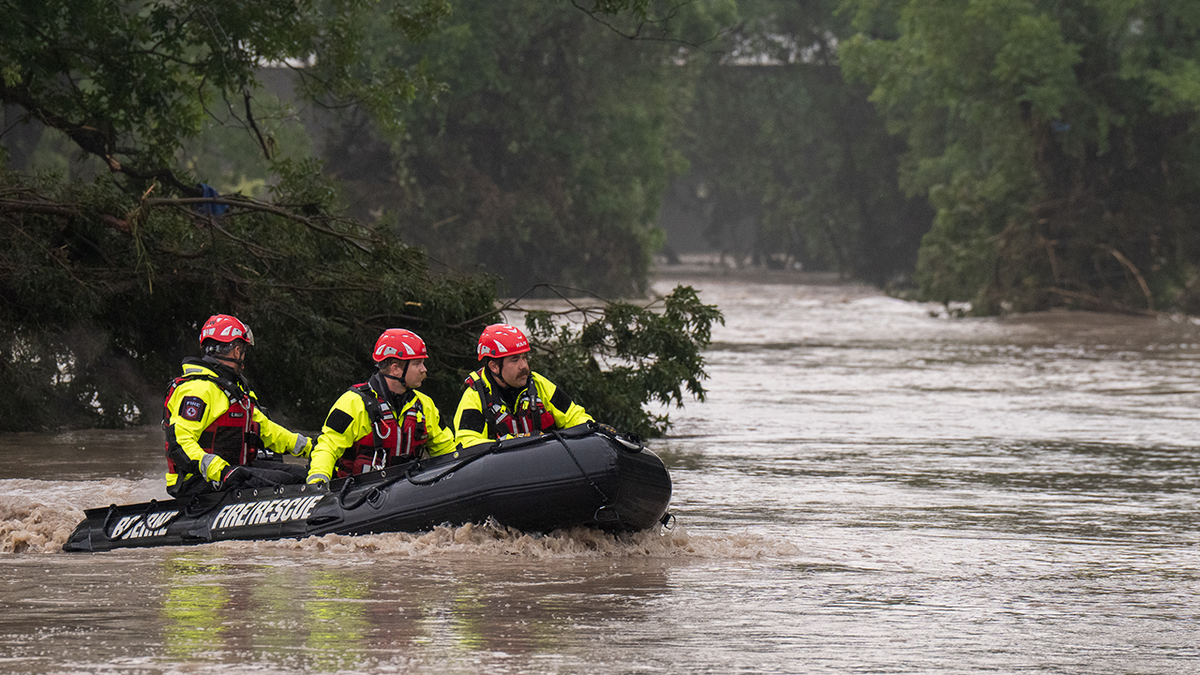 The Boerne Search and Rescue team will navigate upstream on July 4, 2025 in Comfort, Texas, in a bulging boat on the flooded Guadalupe River. Heavy rain caused flooding along the Guadalupe River in central Texas, with multiple deaths reported.