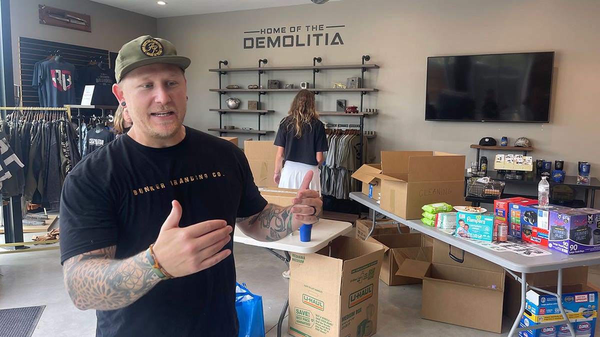 Clint Sanders, owner of Bunker Branding, said he and his wife are figuring out how to help their flood-ravaged neighbors as they go along.