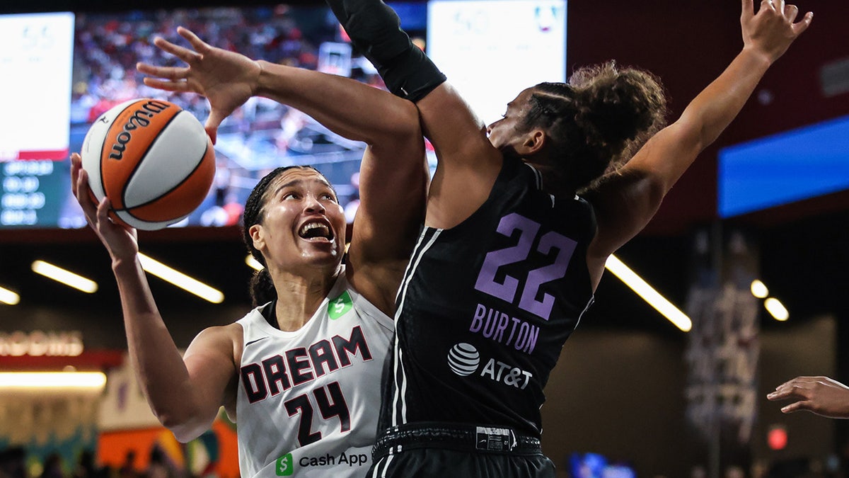 Brionna Jones fights for a bucket