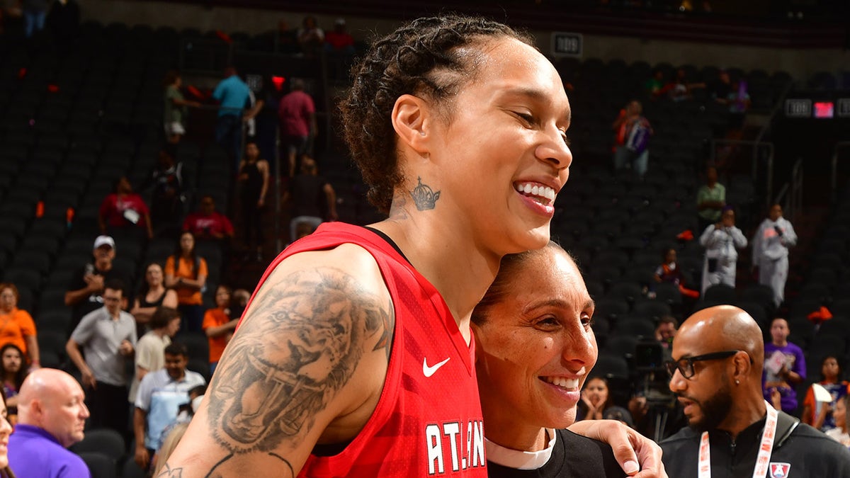 Brittney Griner and Diana Taurasi smile for a photo