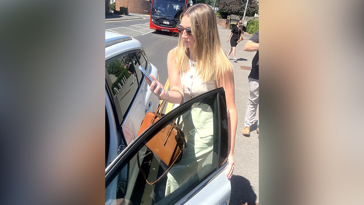 Former PE teacher Bronwen James, 29, leaves Salisbury Magistrates' Court, Wiltshire, Wednesday. 