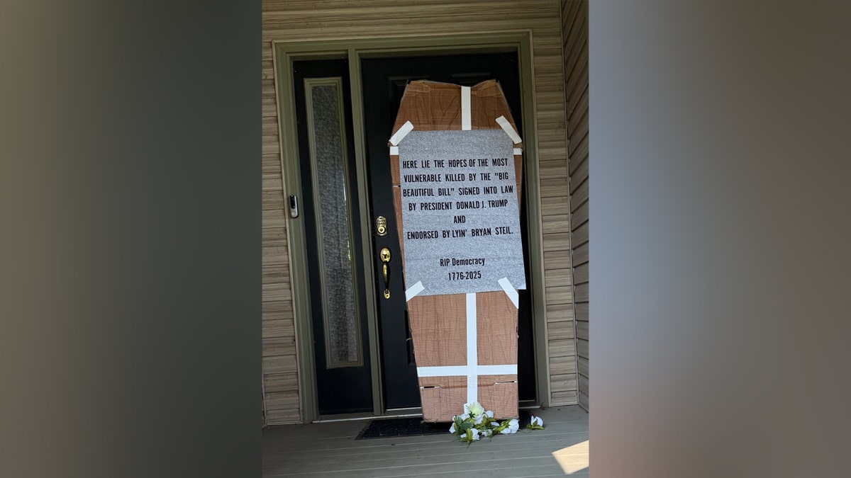 The demonstrators left a coffin fu at the home of a member of Congress, Brian Steel, last week.