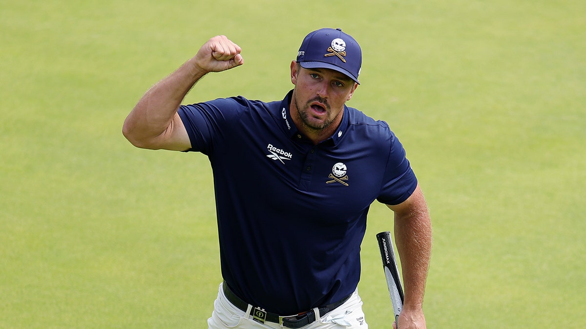 Bryson DeChambeau reacts on course