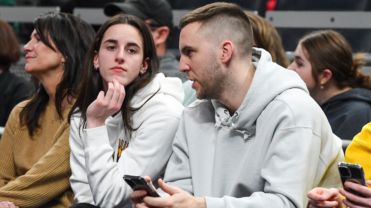 WNBA star and former Iowa Hawkeye Caitlin Clark (L) and boyfriend Connor McCaffery attend a Big Ten Women's Basketball Tournament - Second Round game between the Iowa Hawkeyes and the Michigan State Spartans at Gainbridge Fieldhouse on March 06, 2025 in Indianapolis, Indiana. The Iowa Hawkeyes won the game 74-61.
