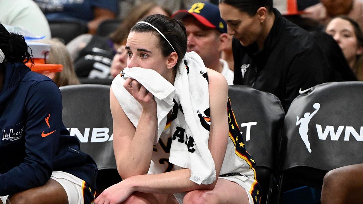 Caitlin Clark on the bench