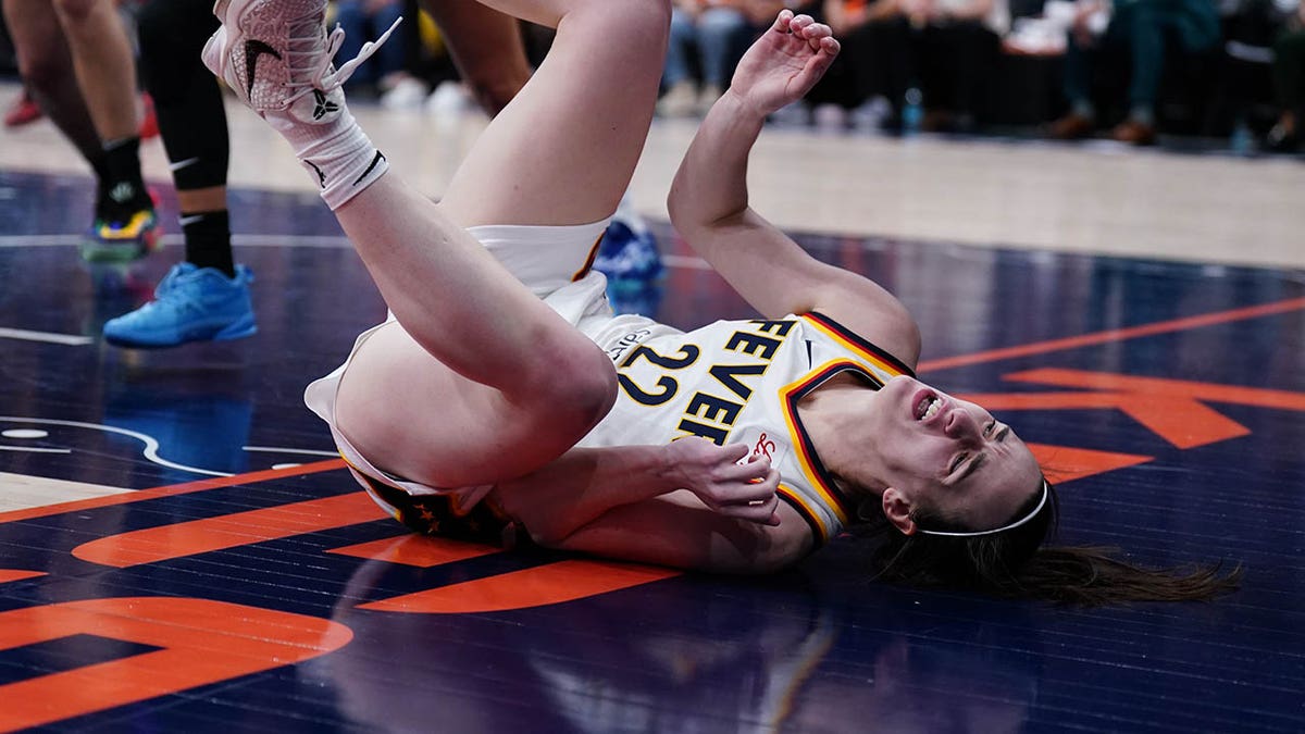 Caitlin Clark on the floor
