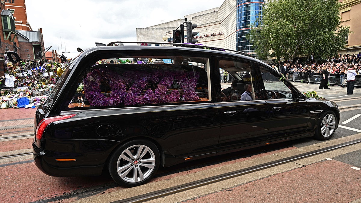 a hearse at Ozzy Osbourne's funeral procession