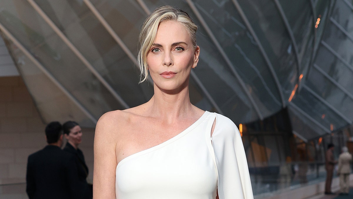 Charlize Theron in a white dress