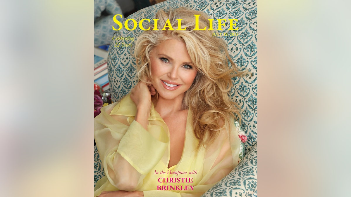 Christie Brinkley posing for the cover of Social Life Magazine.