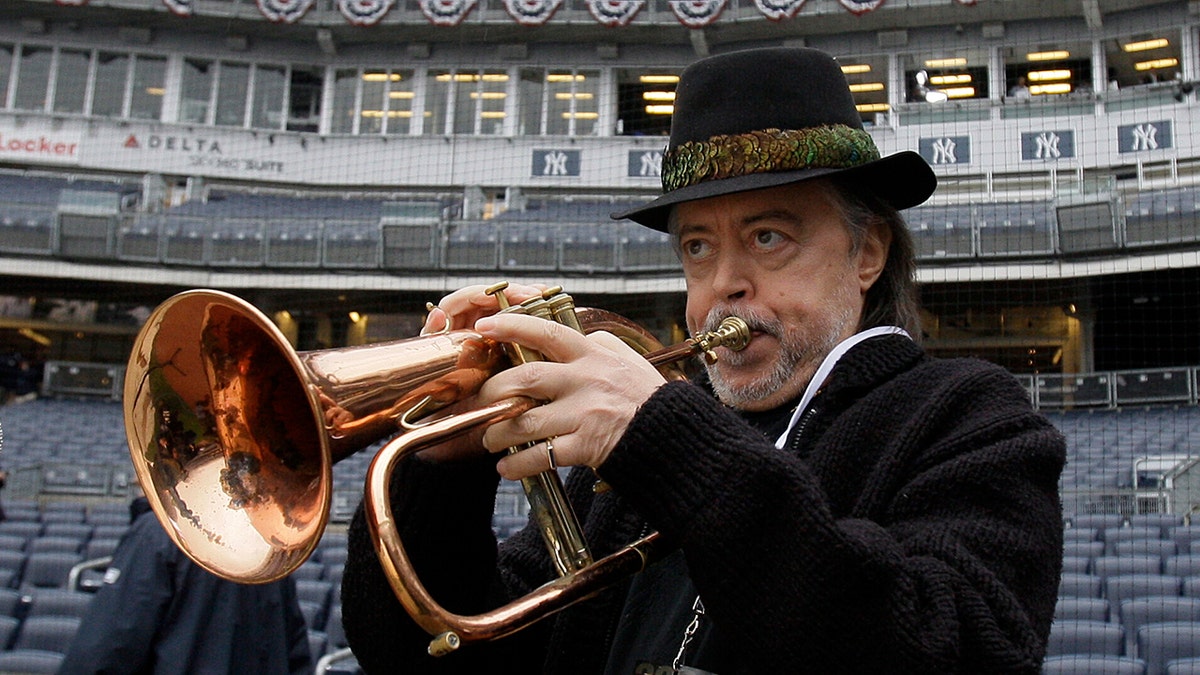Chuck Mangione playing a flugelhorn at Yankee Stadium