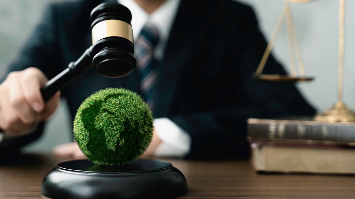 Judge with gavel over planet