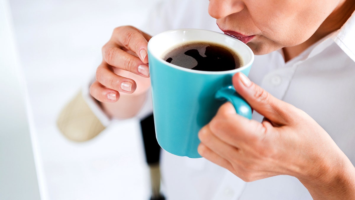 Woman drinking coffee